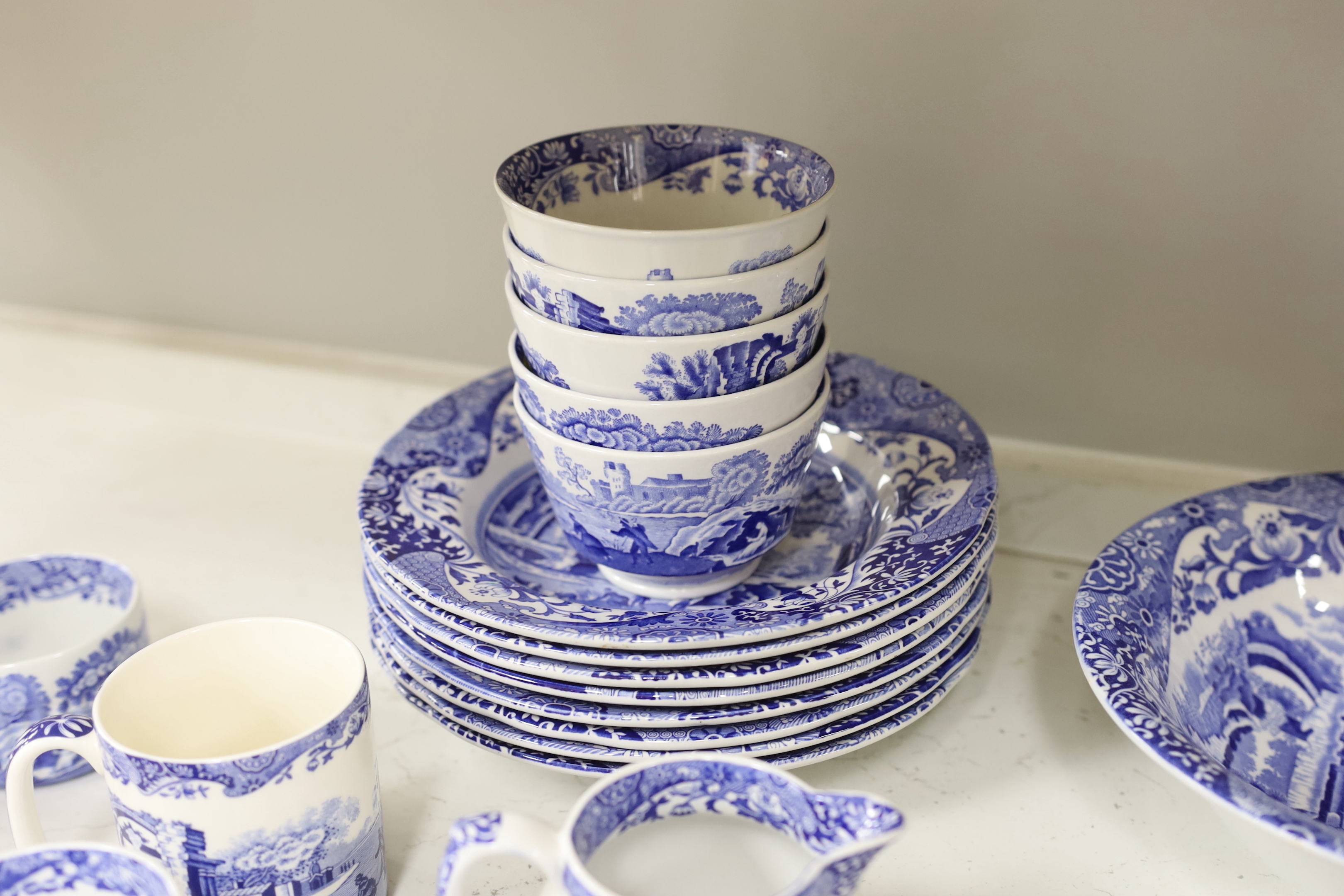 A Spode Italian part breakfast set to include jam and honey pots and covers mugs dishes etc